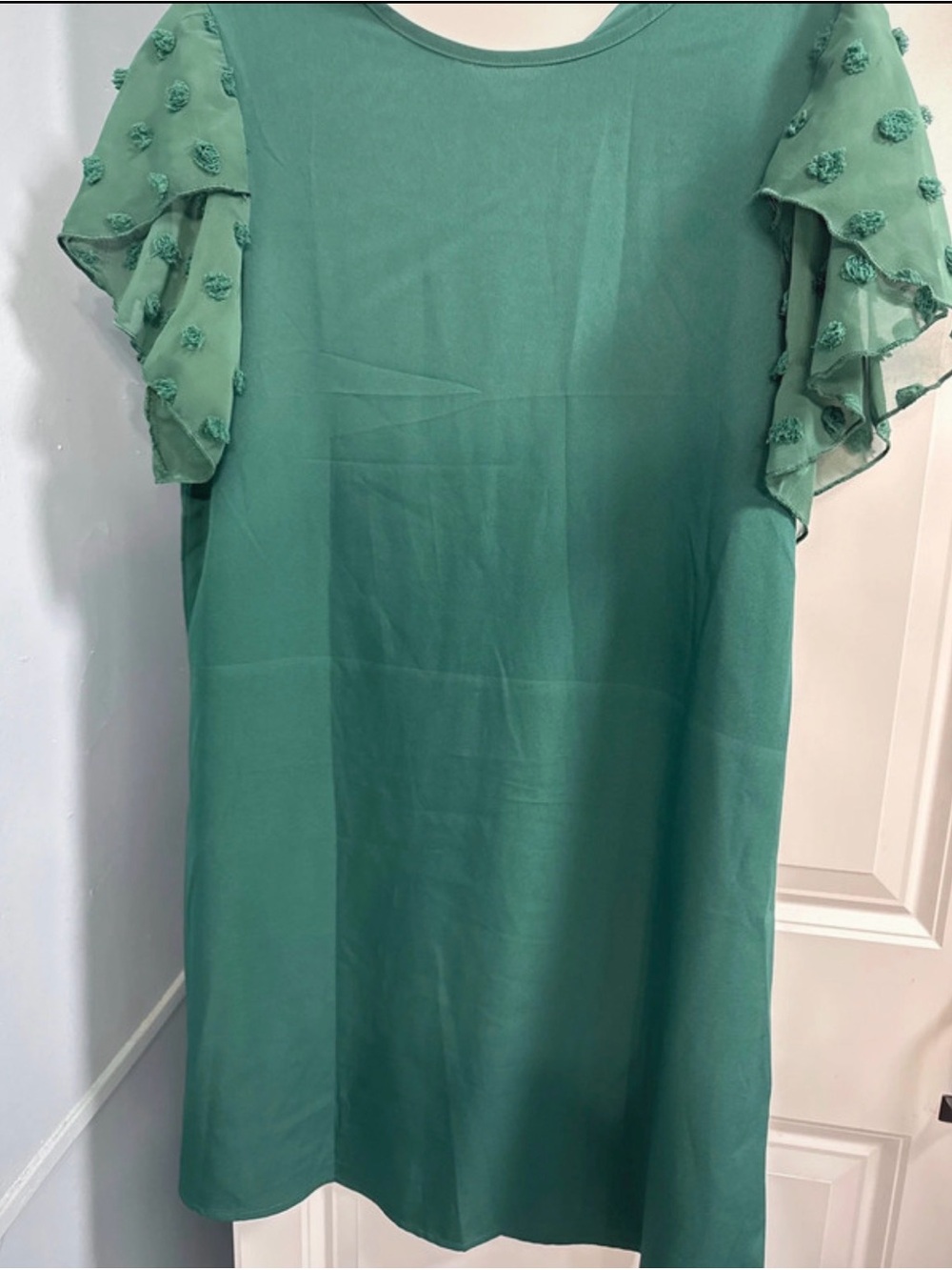 Womenโs Green Flutter Sleeve Blouse